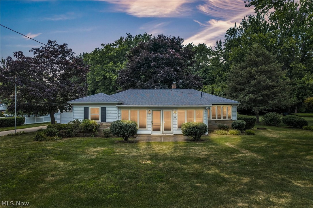This wonderful 3 bedroom, 1.5 bath home features 2 two-car garages on over a half acre lot. Relax in the split screened-in porch or cat nap out in the 4 seasons room. This property is given access to the end of the street (via fingerprint scanner) to North Townline Park where you can launch your boat and enjoy a day on the lake, take a dip in the pool, or play some basketball or tennis. It even has a playground for the kids. And a perk for Perry residence, it comes with free Water/Sewer/Trash/Cable/Internet! Let's see if this home is right for you.