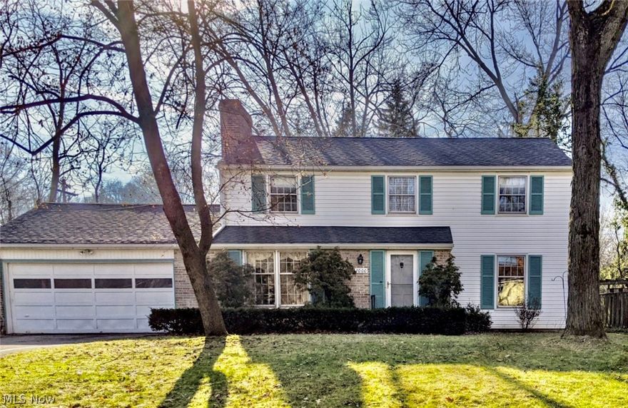 Welcome home to this beautiful 4 bedroom colonial that has it all!  Upon entry you will find a spacious and light filled living room, open to the dining room.  Around the corner is stunning eat in kitchen boasting granite counters, new backsplash and LVT flooring. Upgraded stainless appliances as well!  Settle in with a good book in the inviting family room with gas fireplace and new carpet. Down the hall you will find a conveniently located half bath as well as first floor laundry, great closet space and a lovely 3 season room that opens to the back yard.  Upstairs are the 4 very nicely sized bedrooms.  Master offers a walk in closet and jack and jill bath with private vanity. Downstairs offers the potential for a spacious rec room or a great place for hobbies!  Beautiful hardwood floors throughout the home, most rooms professionally painted with modern neutral colors.  Attached 2 car garage. Spacious yard with a paver patio, a fenced in garden area, a storage shed and plenty of room