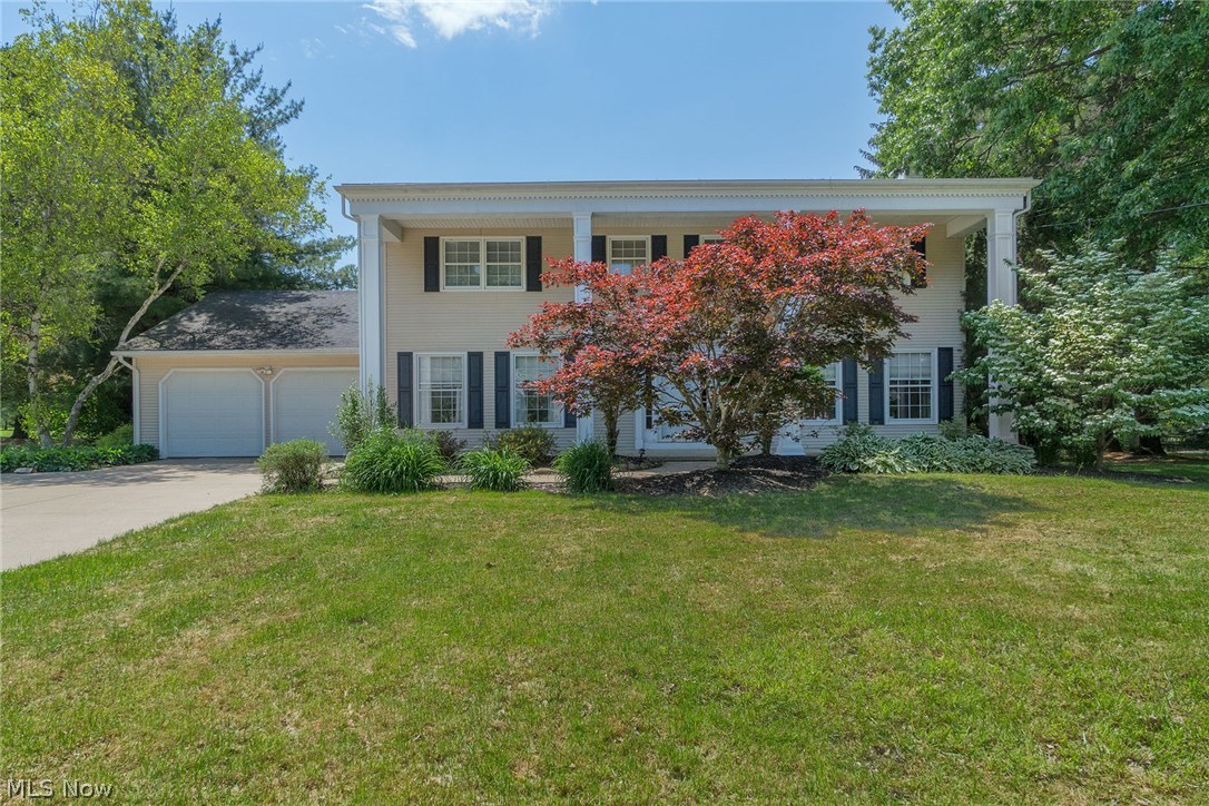 Classic pillared colonial with spacious room sizes. Kitchen is updated with granite countertops and peninsula seating area. Off the large eat-in kitchen is a sunroom with lots of windows to enjoy the private yard with your own inground pool--perfect on a hot summer day. You will love the hardwood floors in the living room and dining room areas. The living room has a woodburning fireplace. Upstairs the four bedroom floors have been refinished to expose the lovely hardwood flooring. A bonus room is also on the second level. The master bath has a large jacuzzi tub and separate shower. New A/C unit installed. One Year Buyer Home Warranty. Need a home fast -Quick occupancy!!