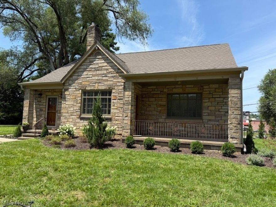 This stunning stone home in a historic area boasts a newly added owner’s suite complete with a full bath, walk-in closet, and a cozy window seat perfect for curling up with a good book. The main level features two spacious bedrooms with beautiful hardwood floors, separated by a new tiled bath. A welcoming living room with a fireplace and a roomy dining area, both with hardwood floors, add to its charm. The all-new kitchen shines with tile floors, a stylish backsplash, and granite countertops.  Custom-made cabinets and solid wood exterior doors.  Nicely landscaped.  Combines modern updates with respect for its historical charm.