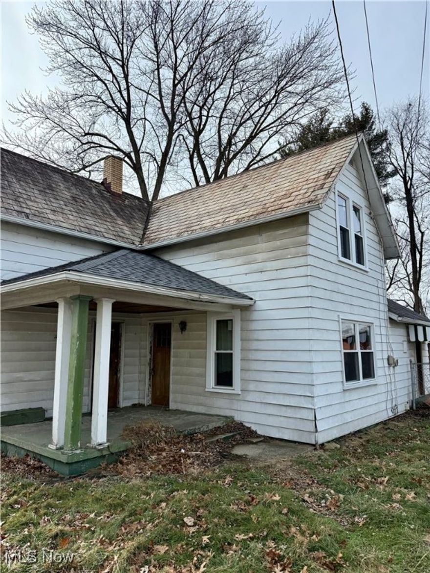 Most windows have been updated and come with a 20-year warranty. The home features newly replaced water lines and a 200-amp electrical panel. The fenced-in backyard provides great outdoor space, and the generous lot offers plenty of room for a future addition or garage. The second floor offers 3 rooms, with one bedroom serving as a walk-through. The first floor includes four rooms and a full bath-giving flexibility to create additional bedrooms, office space, or a family room. The home does need work but it's being sold as-is and offers lots of potential at a great price! If you're looking for space to grow family or a rental opportunity, don't overlook this one.