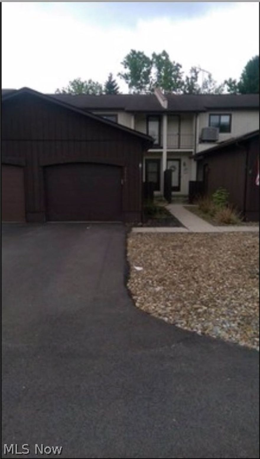 Townhouse style condominium located close to everything in Brunswick. This 2 bedroom 2 bath with attached garage and outside sitting area is the perfect size for someone ready for that next size up from apartment living or looking for a downsize.  First floor is cozy with a fireplace and wet bar for entertaining.  Second floor offers 2 bedrooms both a very nice size and offer ample sized closets.  Call today for your appointment this won't last as they do not go for sale often!