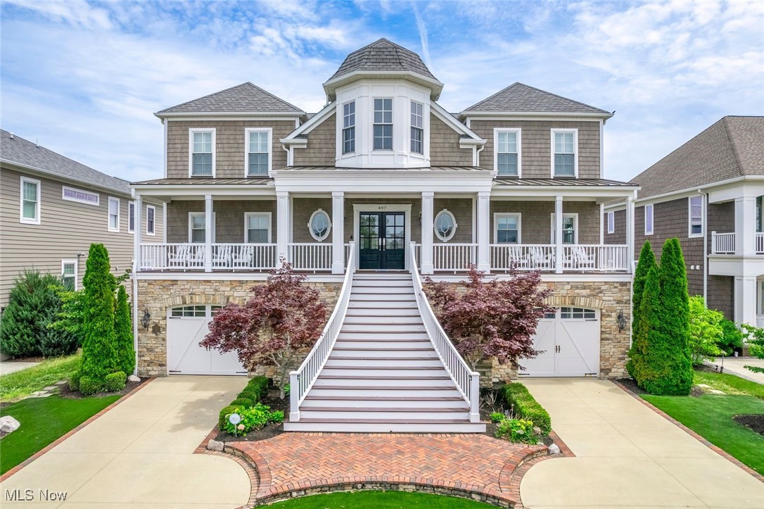 Meticulous home in the desired Bay Point neighborhood is certain to impress. This custom built home is optimally positioned on the site to enhance spectacular views of Lake Erie. Attention to detail is shown in the exquisite millwork, materials and upgrades throughout... the closer you look... the better it gets. Open layout with loads of natural light. Main living on the second floor offers warm living room with fireplace, built ins and vaulted ceiling that opens to dining room. Gourmet kitchen is Chef' dream including custom soft close cabinets, island, breakfast bar, top shelf appliances and plenty of counter space. Primary suite with walk in closet, glamour bath and walk out to balcony. Third floor offers sitting area, 3 additional bedrooms with en-suite bathrooms, spacious laundry room, half bath and bunk room for the kids sleepovers. First floor includes mud room off the garages, huge family / game room, 2 additional bedrooms, full bath and additional laundry. Gorgeous wood flooring throughout. Security system. Resort like backyard complete with screened in porch, maintenance free Trex decking, large patios, stone firepit and outdoor shower... all providing the perfect place to watch the Cedar Point fireworks. The Bay Point development offers a private clubhouse with fitness center, pool, sandy beach, restaurant, market, playground / park, marina... all within a secure gated community. Truly a rare combination of first class construction, quality craftmanship / finishes and breathtaking views offering a lifestyle second to none. Call agent today.