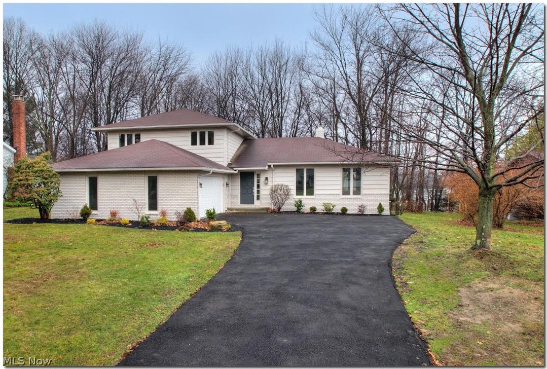 Stunning 4/2.5, Split level home in sought after "Orangewood" Another Fabulous Renovation by" Alix Home Solution". Completed renovation Jan 2016 High-end & quality craftsmanship thru-out. Over $130K in renovations! Custom Chef's dream eat-in kitsch, w/white Aspen 36" Shaker cabinetry, 3 stage crown molding, undermount lighting, industrial vintage light fixtures, Brazilian Calacatta marble counter/backsplash, state of the art S.S appls, incl, gas range, lrg island, lrg sq edge undermount sink, dishwasher, fridge, wine bar area w/wine cooler & hand scraped bourbon 5.25" wd flrs thru-out the 1st flr. Kitch opens to light & bright family rm w/stunning natural stone front fireplc, new sliders lead to a park like setting. Inviting formal Dining rm, formal living w/hand scraped wood flrs. Soaring 2 story foyer, 1 st flr bedrrom/office, 1 st laundry room. Mast bath w/Cust Glass encased shower, rainfall shower head, dble white shaker vanity w/granite counters. This home boasts, gleaming 5"wd