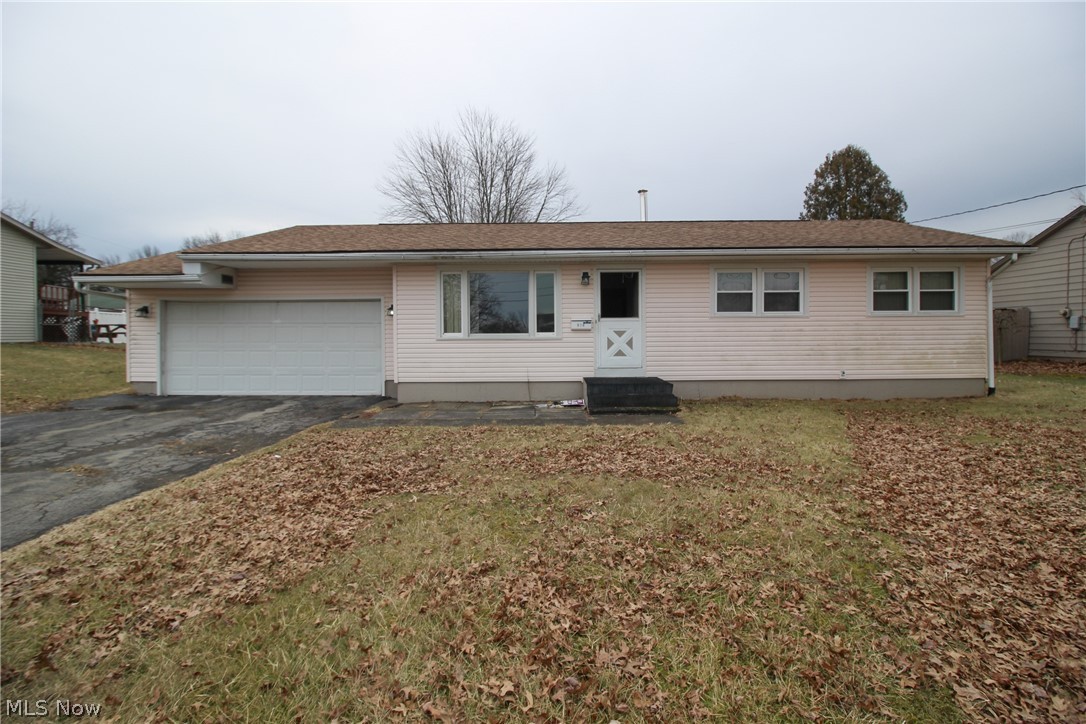 Here's a golden opportunity to purchase a solid 3 bedroom 1.5 bath Liberty Ranch! ONLY $79,900. Features include hardwood floors a large family room, and eat-in kitchen. Additional features include a fenced yard, basement and even a 2 car garage and A/C. This is one you don't want to miss! HUGE potential!!! Property sold AS-IS.