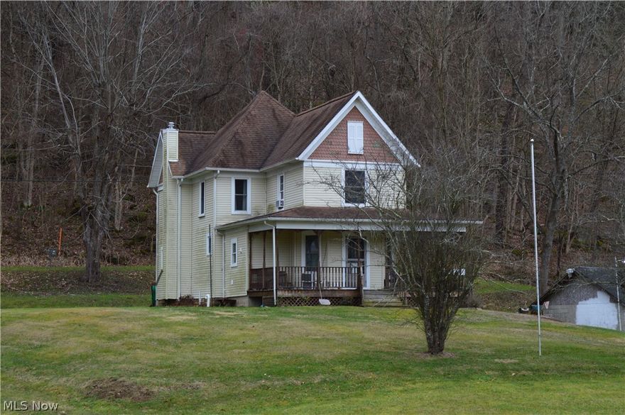 Charming Victorian Style Tyler County Home on 7+ Acres.  Features: formal living and dining rooms, four bedrooms, and a large full bath.  Original woodwork throughout.  Newer roof, siding, wrap around porch, and 12 X 20 shaded deck in the rear.  Three outbuildings, including a 26 X 40 block workshop, a small horse barn, and storage.  Approximately 2 acres of pasture.  This home has lots of potential.  Great out of town central location.  Oil, Gas, and Minerals Rights (OGMs) Do Not Convey.