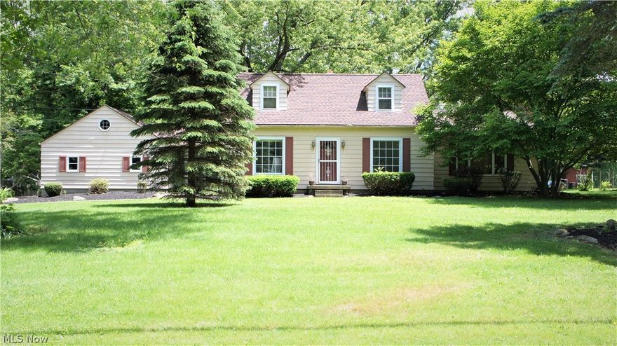 Large charming cape cod with new roof in 2015 located on a quiet 1/5 acre lot with plenty of space between houses.  The entrance of the main garage faces the rear of the house.  There's another detached 2/5 car garage in the rear yard.  Seller has opener and remotes and will leave them.  Master bedroom is upstairs and includes a full bathroom and walk-in closet.  Easy to show.  Call to schedule a tour.