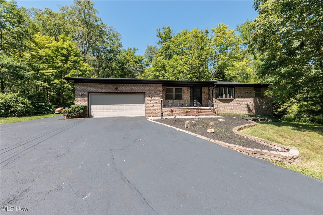 Welcome to this fully renovated retreat in the heart of Richfield. Nestled on nearly 2 acres of serene wooded land, this stunning 3-bedroom, 3 -bathroom ranch-style home offers the perfect blend of modern luxury and natural tranquility. Completely renovated, the open-concept design features gleaming new floors, updated bathrooms, and a chef's kitchen with a spacious island?ideal for entertaining. Abundant windows flood the home with natural light and showcase breathtaking views of the surrounding forest. Whether you?re enjoying the peaceful outdoors or cozying up by the fireplace, this home is a true sanctuary.
Conveniently located near Revere High School and major highways, this property offers both privacy and accessibility.
Listing Agent is also the Owner