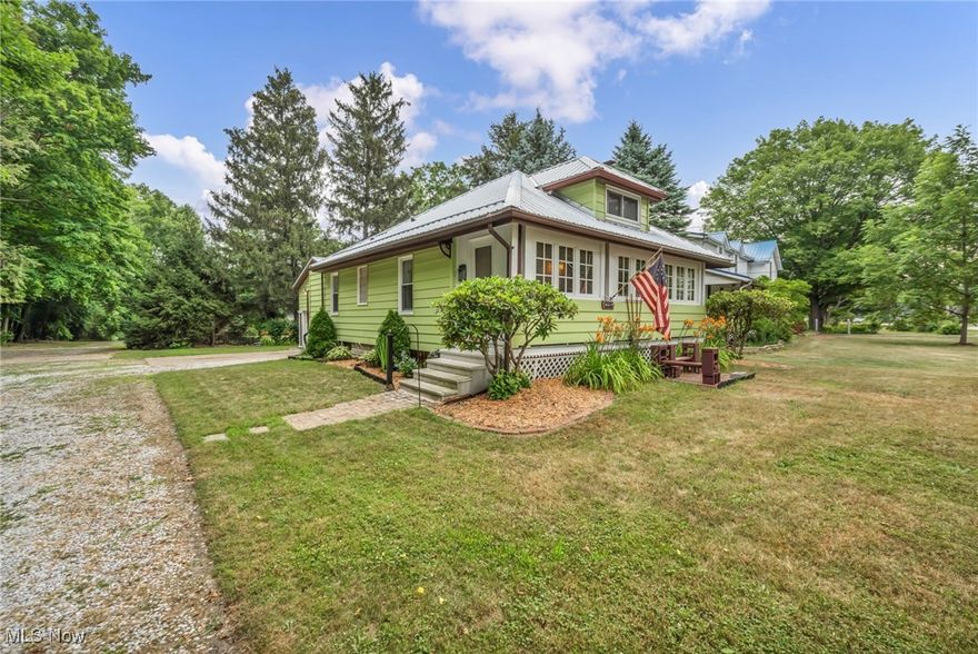 Welcome to this Beautiful Well Maintained Mentor Bungalow Home that blends timeless character with today’s comforts. An enclosed front porch, perfect for relaxing year-round, provides entrance to this Heritage Home. An inviting living room with hard-wood floors and a vented gas fireplace. Kitchen has a new gas stove, open shelves, unique custom built cabinetry, butcher block counter on a cabinet, large single bowl sink and vinyl plank floors. Kitchen windows provide plenty of natural lighting with a view of the private patio. A Beautifully remodeled full bathroom with unique finishing touches and walk-in shower! Two first-floor bedrooms with hard-wood floors. The primary bedroom features carpet and hardwood flooring, makeup area and Jewelry Armoire. Private third bedroom on the finished upper level, ideal for a guest room, home office, or creative space. On the lower level you will find a carpeted room for a possible office space, a rec. area with an electric fireplace and area rug. There is a place ready for your own potbelly stove also! You will find a soaking claw-foot bathtub and sink installed and ready for the final plumbing touches for an additional completed full bathroom! A Tastefully designed closed-in entryway that provides an entrance to the home, lower level, garage or to the nicely landscaped private patio with a gas hook for grill and privacy fence. This home also features a freshly painted, heated-attached two car garage with additional storage space. NEW METAL ROOF in 2023. A larger shed with electricity for added storage! All appliances stay! This home is truly move-in ready and waiting for its next proud owner. Call me today for your Private Showing!