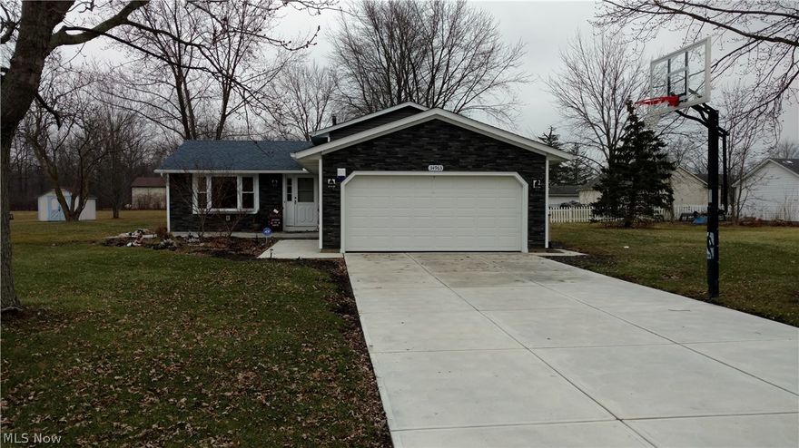 Beautifully Remodeled 3 bedroom Split-Level, boasts Newer Roof (2014), Furnace & C/A (2015), Vinyl Siding & Gutter Helmets (2017), 
Driveway (2017), 2.5 Car Attached Garage, 12X20 Covered Back Porch, Large Out Building.  Additional lots that transfer w/property!