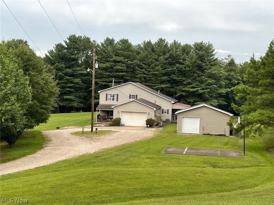 Back on market due to financing issue on buyers part.  Appraisal, home inspection, septic and termite were completed!  New roof being installed October, 2022. Beautiful park like setting!  This spacious 3 bedroom 3 bath home sits on approximately 6+/- acres. Family room offers a wood burning stove with access to mud room to front covered porch, office offers built-in bookshelves with French doors to kitchen,  formal living room has built in entertainment area with shelving, cathedral wood ceiling and has French doors to covered 10x36 covered deck that leads you to your inground pool with patio area overlooking your stocked pond with fountain and dock. Owners suite has two walk in closets and balcony overlooking your pool, pond and private back yard. 2nd and 3rd bedrooms offer wood ceilings. Home offers an automatic backup generator, elevator lift in garage that leads you to laundry/mud room, two car attached and one car detached garage in addition to a barn. Basketball court area. Beautiful wood trim through out, abundance of closets and so much more.   Easy drive to Belpre, Parkersburg or Athens.  Pre-qualified buyers only please, per seller!