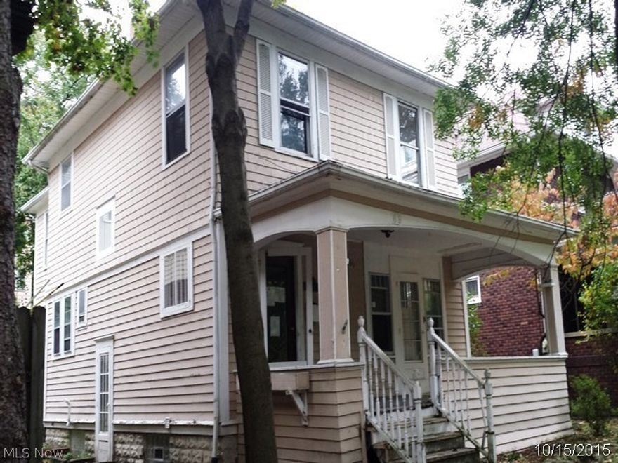 Lovely colonial with mid-century character you'll fall in love with! Great location, close to parks, major Akron roadways, shopping, entertainment, and even The University of Akron. Home has a large front porch, white wooden trim on windows and doors, large rooms, a wood-burning stove, and more. Come see the possibilities today!