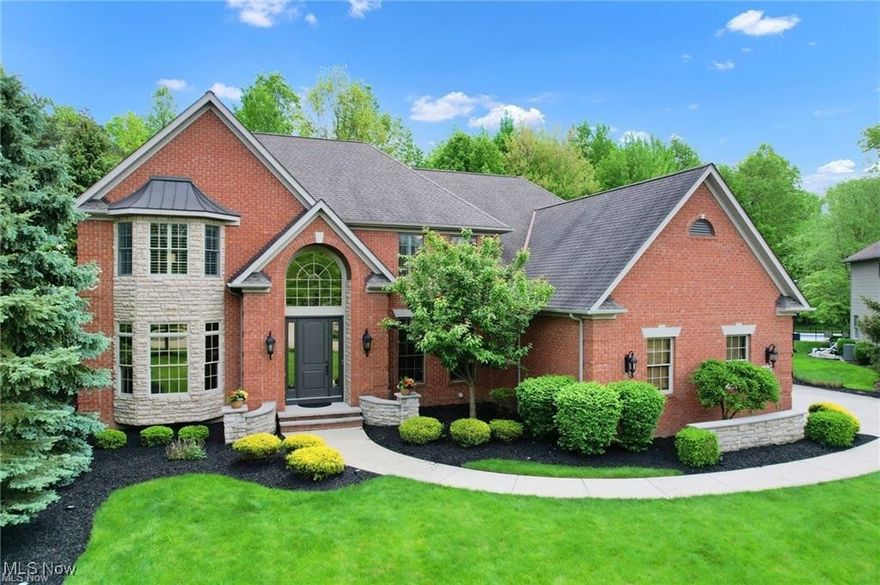 This exquisite custom-built home features 4-5 bedrooms and 4.5 bathrooms! The architectural detail throughout offers the perfect blend of elegance, comfort and entertainment! The first floor boasts a traditional layout, including home office, formal dining room, living room and the kitchen opens to the two story family room! Walls of windows allow for natural light and views to the gorgeous landscaping. The second floor consists of 4 bedrooms and an additional tandem bedroom. 2 bedrooms share a jack and jill bathroom and one bedroom has an en suite bathroom as well as the master bedroom. The magic of this home is in the lower level! A full bar, theater room, work out room complete this space which is perfect for all of your entertaining needs! Hosting a cook out? The patio space is perfect for all of your outdoor entertaining needs, built in gas grill on the gorgeous patio as well as a firepit. The lush landscaping has been beautifully maintained and offers a private setting in the backyard. This home is filled with quality upgrades and updates! Schedule your private showing today!