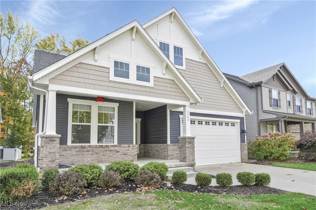 Welcome to this better-than-new Drees-built ranch home ideally located near Brunswick Town Center with shopping, dining, and Brunswick Lake Park just minutes away. This quality-built, energy-efficient home offers the perfect blend of luxury, comfort, and convenience in a sought-after neighborhood. Step inside to an open-concept floor plan with vaulted ceilings, engineered hardwood floors, and abundant natural light. The gourmet kitchen features quartz countertops, soft-close cabinetry, ceramic tile backsplash, pendant lighting, a breakfast bar, and stainless steel appliances—ideal for both everyday living and entertaining. The dining and great room flow seamlessly together, enhanced by an upgraded lighting package with recessed lighting, designer ceiling fans, and high-end finishes throughout. Enjoy your morning coffee in the four-season sunroom or step out onto the 15x10 composite deck overlooking the beautifully landscaped yard. The luxurious owner’s suite offers a private deck, dual vanities, a step-in tile shower with dual showerheads, and a large walk-in closet with pass-through to the laundry room for ultimate convenience. Two additional spacious bedrooms and a full guest bath complete the main level, making this the ideal one-floor living home. Additional highlights include 9-foot ceilings on both the main level and basement, an oversized 9-foot garage door, and a full basement offering exceptional storage and finishing potential. Enjoy low-maintenance living, move-in ready condition, and modern construction that delivers style, energy efficiency, and peace of mind. This home checks every box—open floor plan, luxury finishes, and a prime location—making it truly a place to call HOME.