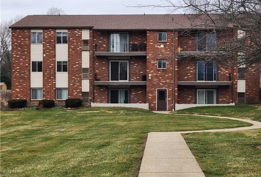 This 2 bedroom, 1 bedroom condo with a private balcony is the perfect opportunity for a buyer ready to add their personal touch. Freshly painted with updated kitchen cabinets , this home already has a head start on updates but could use some more TLC to truly shine. Situated in a fantastic location with a parking lot in rear of building. Don't miss this affordable opportunity today, schedule your showing !