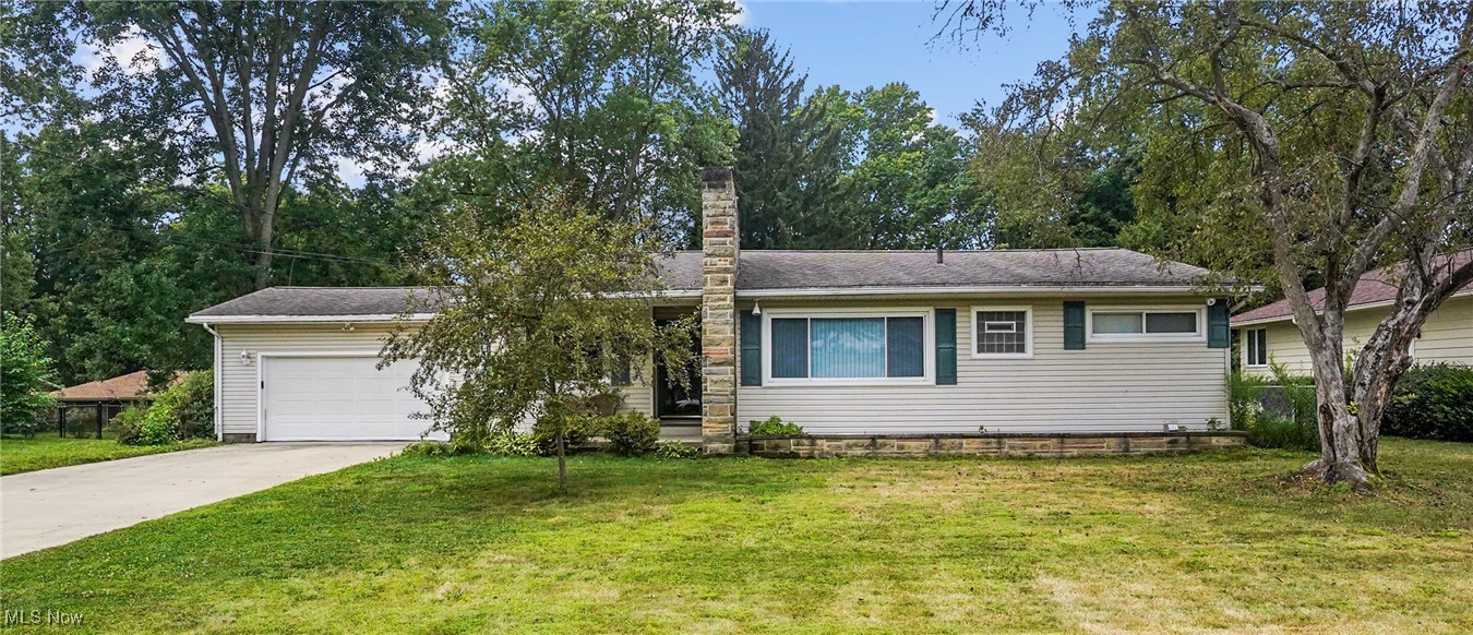 Welcome to this well maintained ranch in the heart of Fairlawn. Step inside and you'll love the open floor plan featuring a large living room with stone fireplace, formal dining room, attached 3 season Sun room with access to the back yard and patio. The kitchen includes all appliances with a door to the Sun room and corner eating area. Three bedrooms off the living room all have carpeting but appear to have hardwood floors ( as seen in the closets). Nice size full bath off the hall way and the primary bedroom has its own bathroom. The lower level could easily be finished with some new flooring and a ceiling. The other half of the basement is unfinished with plenty of storage and laundry. The lot size is 95x155 with plenty of back yard space to fence in. Roof replaced approx 2015, Siding and window 2001, Furnace and A/C about 2005.
