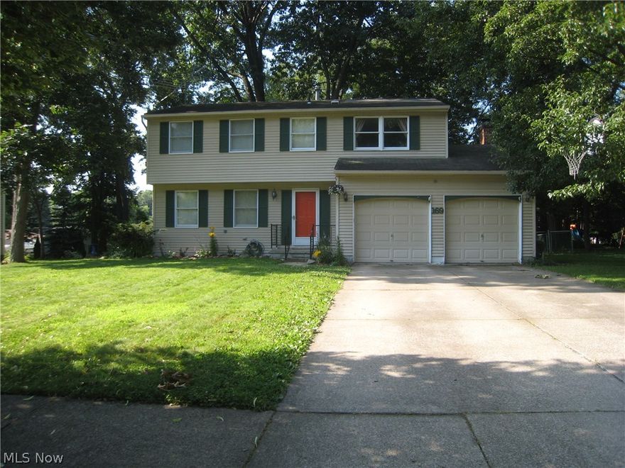 This four bedroom colonial is wonderful. The kitchen has be totally updated with stainless steel appliances,Corian counter tops and breakfast bar. The cabinets are Craftmaid. The are hardwood floors in the kitchen, living room and formal dining room. The family room has a wood burning fireplace and sliders out to the patio. There are four nice size bedrooms on the second level with a very rare walk in closet addition. The basement has a finished rec room with a full bath. The backyard is fenced with a play area. The furnace and central air BRAND NEW as of SATURDAY July 25th 2014. You wont be disappointed!