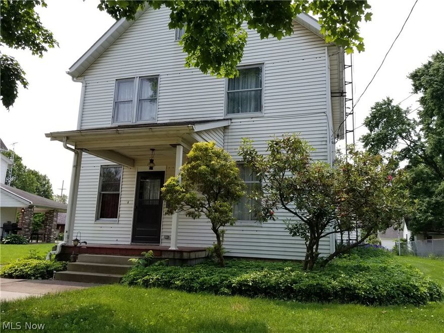 Lots of Charm & Character !  2 story Colonial featuring a tiled ktchen, Formal Living Room & Formal Dining Room, Foyer.  2nd floor has 3 BD's, full bath ( tub).  Walk up attic for storage.  Beautiful woodwork throughout, enclosed back porch, front covered porch, full basement with tiled shower & commode, walk out, updated electric ( 200 amp.), 2 car detached garage + 1 car detached garage - 3 parcels.