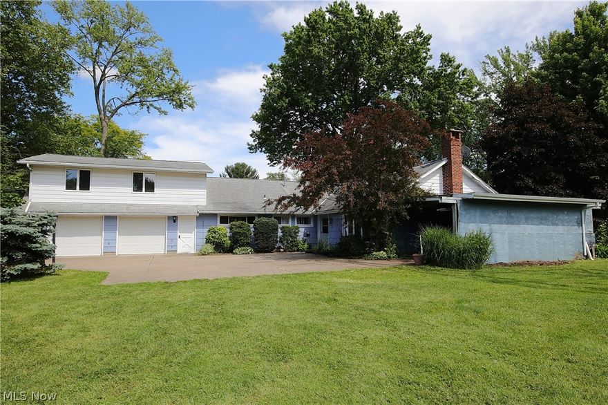 Prepare to be amazed by the endless opportunities this home and land has to offer! With nearly 2400 square feet of living space, this home can be perfect for a growing family. Originally built as a ranch, the owner has improved this home with a spacious addition that includes a 2 car heated garage and a very large 2nd floor which could be used as an in-law suite, teen suite, or could be split up into 2 bedrooms. This addition comes with its own full bath, plenty of storage and has central air. The rest of the home has 3 bedrooms, 1 full bath, 1 half bath and 2 very large living areas that are equipped with wood burning fireplaces and built in bookshelves. The huge 38x11 all season room is lined with windows from top to bottom which overlooks the deck, patio, and is only a few steps to the sparkling inground pool. The pool has been well taken care of over the years and is ready for this Summer's heat wave! This home includes 2 parcels that totals 1.2 acres of a mature and open yard. This home does need some TLC and updating but a little bit of sweat equity will go a long way! This home is centrally located to everything Berea has to offer. It is less than 10 minutes to Cleveland Hopkins Airport, less than a mile to Berea Falls Metroparks, minutes to shopping, places of worship, and all amenities. You will not want to miss this opportunity!