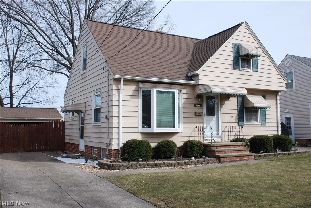 Take a look at this well-taken-care-of charming three bedroom cape cod in desirable West Park area! New furnace April 2018! Nice capability of a 4th bedroom in basement. A new beautiful bay window in main living area plus two first-floor bedrooms with original hardwood flooring. This home has an updated eat-in kitchen with natural sunlight. Large fully-finished rec room, plumbed for second bathroom, handy laundry/storage area. Rec room has a very nice carpeted bedroom next to it with built-ins for a nice child's playroom option. Oversize 2 car garage! The large backyard with full privacy wood fence is great for family activities, pets, children and gardens. Fresh and clean modern décor throughout. Very nice tiled bath with upgraded pedestal sink. Mostly new light fixtures, upgraded front door, and tilt-in vinyl windows. Glass block windows in lower level. Ceramic tile in bathroom, kitchen, and laundry areas. New one-layer roof on home/garage in 2013, some newer insulation, 100 amp