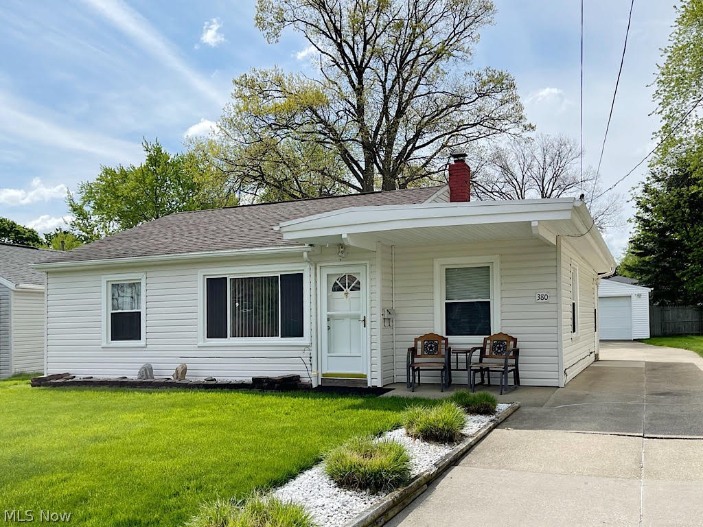 Exceptional opportunity for one floor living in this adorable, 3-bedroom ranch in an area of super nice homes! The outside will impress, with vinyl siding and an architectural shingled roof. The inside is welcoming with fresh paint and neutral colors. The living room is good-sized and the eat-in kitchen has loads of cabinets for storage, all the appliances and room for a nice sized table. You’ll appreciate the convenience of the utility room close by, too. The bedrooms are roomy. One is even being used as a home office. Improvements include vinyl siding, a new roof and blown-in insulation, all in 2007, and you’ll love the updated, Polaris white vinyl windows for energy efficiency. If you’ve been hoping for a nice yard, this is it! The lawn is lush and green, and you'll be able to sit out back for hours watching the children play or spend quality outdoor time with family and friends. The long driveway leads to a 2 car detached garage with storage galore, and if that’s not enough, there