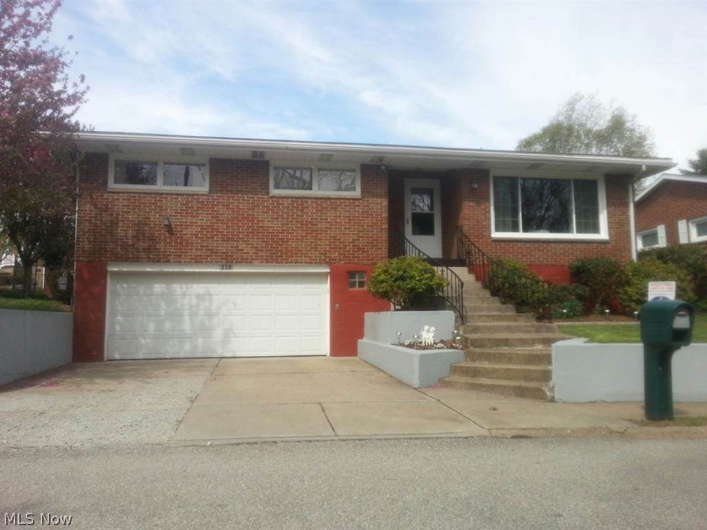 Many updates in this home! 2013- Remodeled kitchen with hickory cabinets and granite counter tops. Flooring in kitchen, LR, and rec room. Rec room has a beautiful wood burning fireplace with a new cover & grate. Chimney was cleaned and a new cap & leaver were installed. Large picture window in LR was replaced w/ lifetime transferable warranty. 2011- Furnace, CA unit, breaker box. 2010- Water tank. All appliances except oven are less than 1 yr.