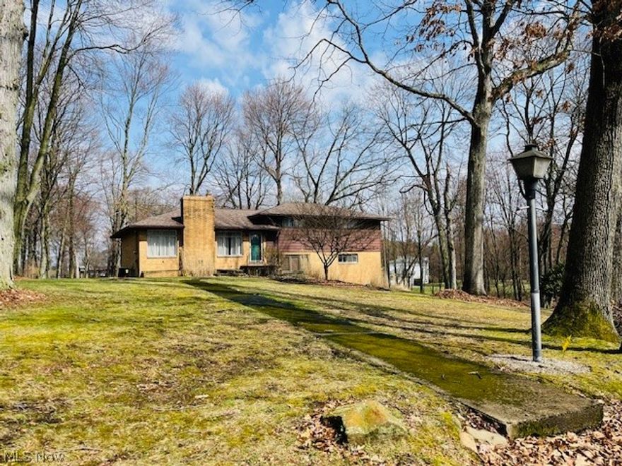 GREAT LOCATION in Suffield for this 3 BR 2 full BA brick home on 2.71 acres.  Perfect lot size at 206 ft. of frontage & about 580 ft. deep located on a dead end road.  You will notice the deep private lot as you pull down the long driveway w/extra parking.  Exterior updates include:  new septic in March '24, garage door/opener '22, roof in '22.  Inside offers good space w/a large 21 x 15 living room w/brick fireplace.  Upstairs offers full bathroom w/double sinks and 3 large bedrooms (one is 17 x 12 & another is 16 x 12) w/wood floors. Basement is clean and dry w/waterproofing just completed in '24.  Pressure tank & pump new in '23.  With some work, this one will make a great house to call HOME!