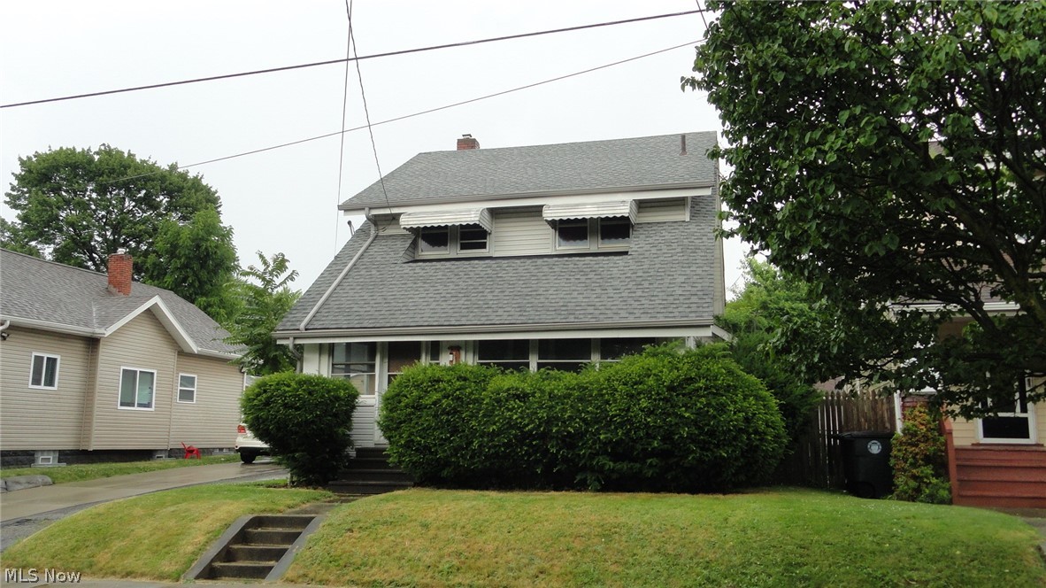 Here's a solid home in a nice area that has a newer roof, electric and furnace but it needs some repairs and a total cosmetic renovation. It's a great floor plan with a large formal living room with fireplace,an eat in kitchen, a formal dining room, a large enclosed front porch plus a first floor bedroom and a first floor full bath! The second floor has three more bedrooms and a second full bath. Full basement and a 2 car garage. With the needed updates, it will be a nice home for the next family to enjoy.