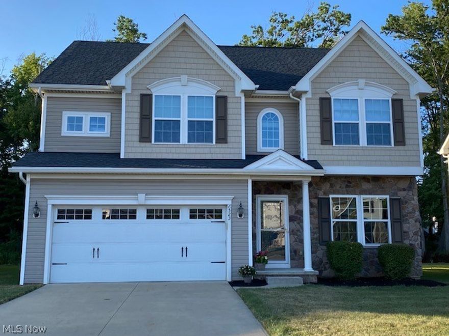 Only 7 years young, this beautiful 4 Bedroom, 2.5 Bath colonial is in desirable Hidden Woods situated on a prime lot, near the cul-de-sac.  Large 17 X 11 kitchen with island and bar stools, wood floor, all appliances included and a fabulous morning room that accommodates large gatherings.  A full wall of windows makes for a very light, bright and cheery room that overlooks a great backyard.  The 20 X 15 family room is great for everyday living or entertaining!  The dining room has hard wood flooring, too.   The second floor has a supersize master suite with huge walk-in closet, master bath with shower and soaking tub and double sink vanity.  The size of the additional three bedrooms will amaze you - all are of very good size.   The laundry room is on the second floor and includes the washer and dryer.  There is a significant amount of storage space in this sizeable laundry area.  The stamped concrete patio overlooks the picturesque, treed backyard...The full basement is plumbed and rea