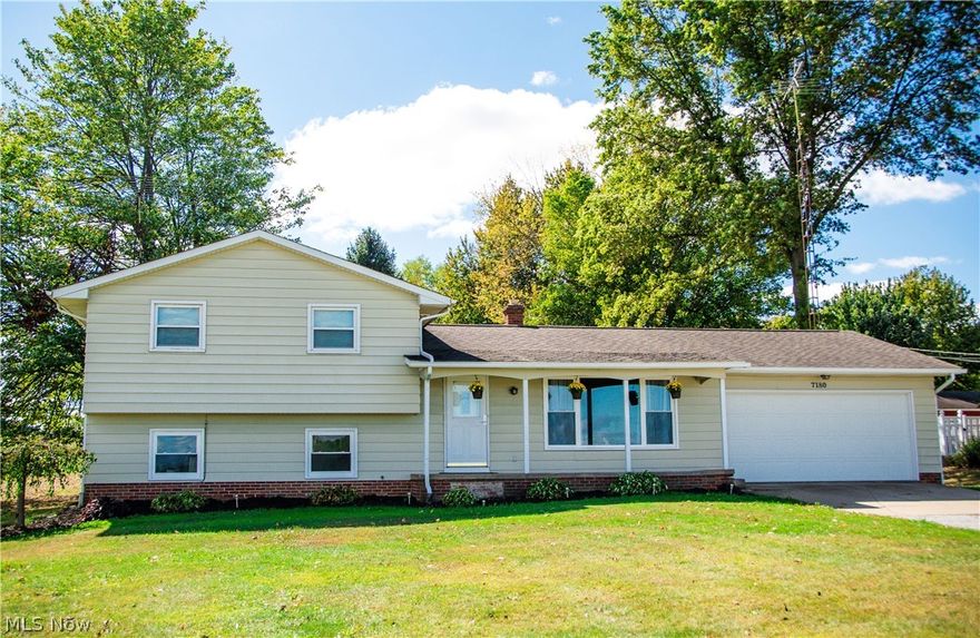 Country living at its best in this wonderful four level split with its beautiful neutral décor and open floor plan on 1.21 acres backing up to a farm in the excellent Marlington school district. You’ll feel like you just got home when you walk in the front door & see the large living room with its large picture window & fireplace new in 2013. The tiled foyer runs straight through to the generous sized dining room which is wide open to the awesome kitchen featuring granite countertops and tile backsplash new in 2015. There’s tons of cabinets along with a pantry & includes all the appliances which were new in 2013. There’s plenty of room for family & friends in the huge family room which is beautifully finished with built-in cabinets & bookshelves and French doors leading to the patio & the enormous, private backyard. Other improvements include: new windows 2017, new well pump 2017, house power washed 2017, new heat pump & air conditioner 2014, new water softener 2013, new carpeting in 2