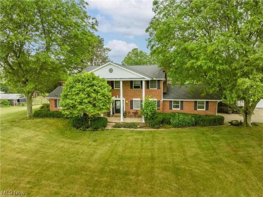 ONE OF A KIND PROPERTY LOCATED IN THE MIDDLE OF HARTVILLE. Charming Country Setting, large Colonial Style home With 5.75 Acres, Beautiful Lot With 10 a stall, State of the art Horse Barn along with Plush, fenced in Pastures, Stocked Fishing Pond. Inground heated, salt water Pool And Hot Tub all located on a sprawling back patio/deck combo that includes numerous updates, most notable, a built-in granite BBQ area. Spacious Rooms inside with a Great Floor Plan, Cathedral Ceilings And Much More! Additional 2 car detached garage with loft. Extra shed. 3 Fireplaces, Custom Crown Moldings, Cathedral Ceilings, Remodeled Kitchen and newer LVT flooring in most of the 1st floor. This is a must see property if you’re a horse enthusiast or looking for your own slice of country living, yet close to everything. Located in Lake Local School district.