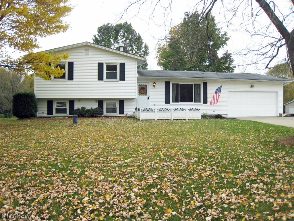 Don't miss your opportunity! This 3 bedroom, 2 full bath home is move in ready! Tired of parking outside? You'll love the 2 car attached car! All bedrooms are on the upper level with a full bath that has a door to the hallway and a door to the master bedroom. Each of the rooms have spacious closets. Large living room, dining room, and kitchen on the main floor. The lower level features a large family room with another full bathroom and bright laundry/utility room with full height windows. The backyard features a large deck and has a very spacious & private view. New well in 2014. Newer water heater, windows and electrical service. The home is priced well and won't stay on the market long, so schedule your showing today!
