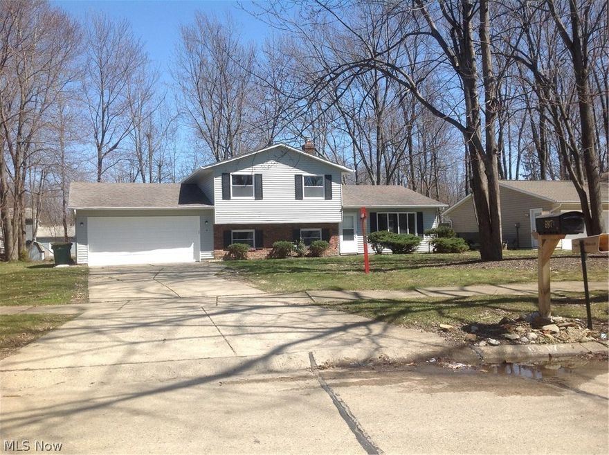 You will love this beautiful, updated split-level situated minutes away from I-90, 615, and 306 in one of Mentor’s most desirable neighborhoods!  With over 1800 square feet, this immaculate house has all new tile and plush carpet, freshly painted walls, and an enormous family room for entertaining.  Upgrades include new Anderson windows throughout the house and a luxurious master bathroom with a new vanity, tub, handheld showerhead, and tile floor.  Imagine cooking in your newly remodeled, gourmet kitchen with new countertops and a stainless fridge, stainless sink, new GE stove, and new Whirlpool dishwasher.  With a freshly painted exterior, an oversized 2 car garage, and a private, professionally landscaped backyard, this captivating home is perfect for your family.