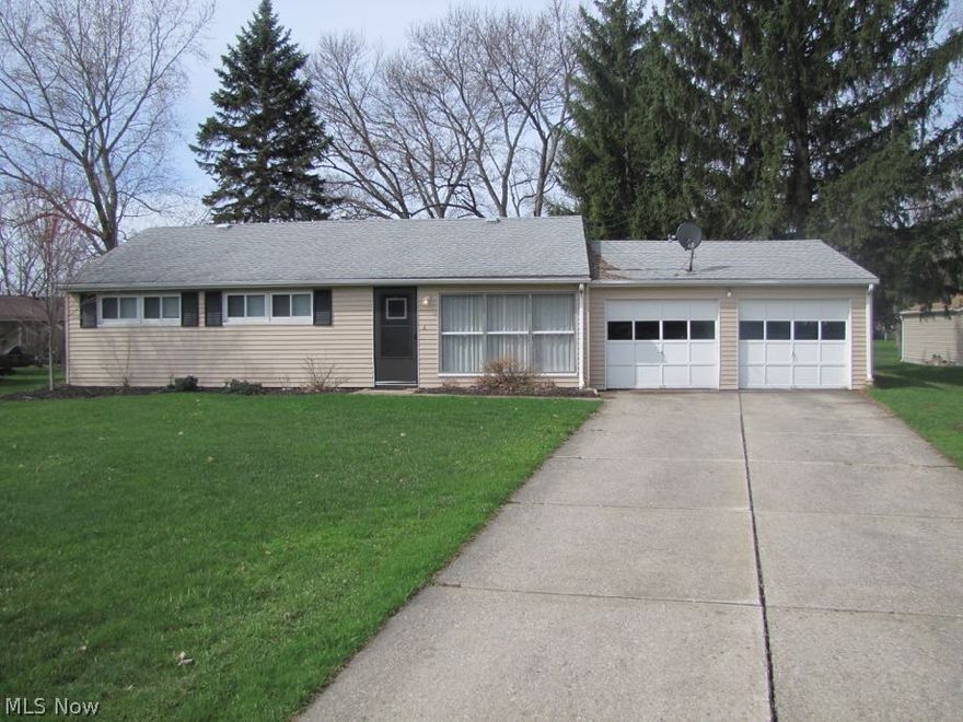 Welcome to this Fantastic Updated Ranch!  The Living Room has a Beautiful Bay Window that views the Park across the Street.  The Large Eat In Kitchen has Stainless Steel Appliance, Beautiful Cabinets and has plenty of Space for a Dining Table.  The Bath has been updated with a Gorgeous Tiled Shower.  The Three Bedrooms offer Plenty of Space and Neutral Decor. Do Not Forget the Washer and Dryer in the Hallway Stay for the New Homeowners. The Backyard is Private as well!   Newer Windows were installed in 2012.