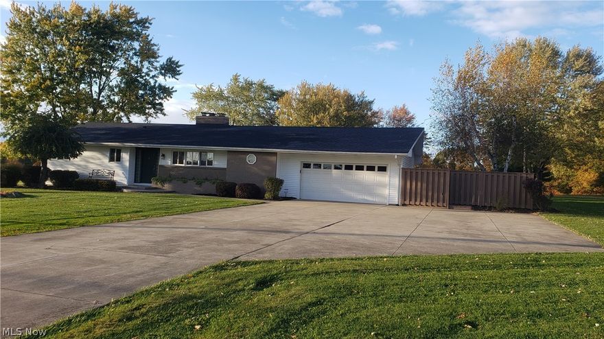 This sprawling vinyl sided Ranch home features a large open LR/DR space with wood burning fireplace and an oversized bay window to look out over your 1.38 acre property. Also Off the back is an enclosed covered patio which continues on to a private side deck area. There is a 2 car attached garage plus a 2 story 2 car detached outbuilding. The Full finished basement has Family room with fireplace,  Recreation room with a workable sauna, another finished room that can be used for entertainment plus a room for an office or other, a utility room and other areas for storage. There are 3 Bedrooms and 2 full baths and the convenience of a first floor laundry. Home is equipped with an in house generator, 2 sump pumps and has updated electric. Furnace is 2 yrs, AC a little older and the Roof is approx 8 years old.