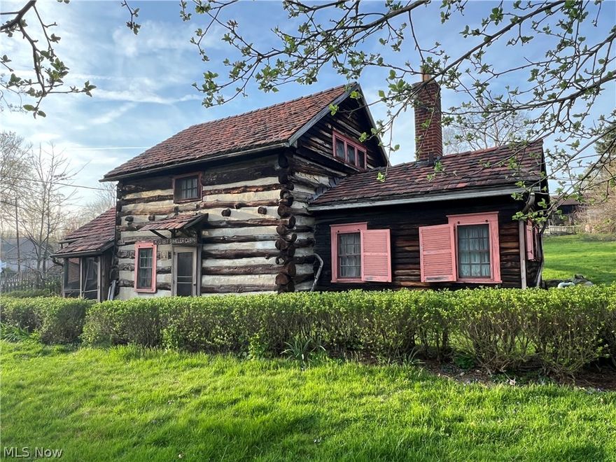 One of a kind-historic log home, one of the oldest still standing in the Zoar community!  Original Bimeler Cabin was one of the first buildings erected in Zoar, and also served as the first meeting house.  2 bedrooms, 1 bath.  Beautiful hardwood floors.  Brick fireplace.  Spacious yard with grape arbor.  2 car detached garage with electric.  Property sells as-is.  BIMELER CABIN #10.
