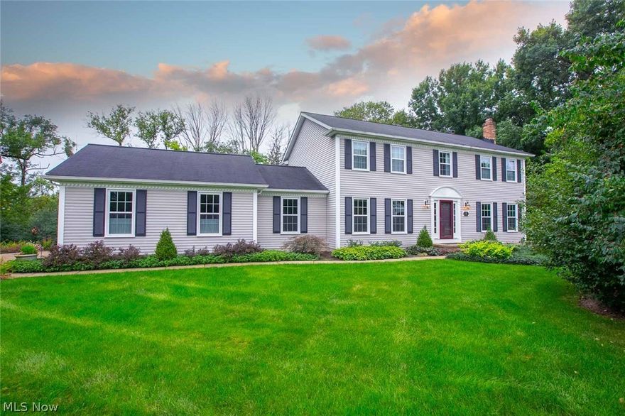 Coming Soon! Welcome to this well-maintained 4 bedroom 2.5 bath colonial home offering many updates throughout including many new windows and upstairs newer carpeting. Beautiful open eat-in kitchen with neutral decor, stainless steel appliances, hardwood floors, and ample cabinet/counter space. Dining room offers fireplace and French doors that lead to a large family room with 2nd fireplace and custom built-ins, perfect for gathering with family and friends. Living room is accented with elegant wainscoting and crown molding. Quiet, convenient first floor office. Charming four seasons sun room addition with skylights and plenty of windows to allow lots of natural light and peaceful view of the backyard. Master bedroom complete with walk-in closet and bathroom. 3 additional bedrooms and walk-in closet for extra storage. Finished basement is a perfect additional area for rec room and relaxing space. Enjoy the outdoor comforts of a large upper deck that leads to the lower paver patio with