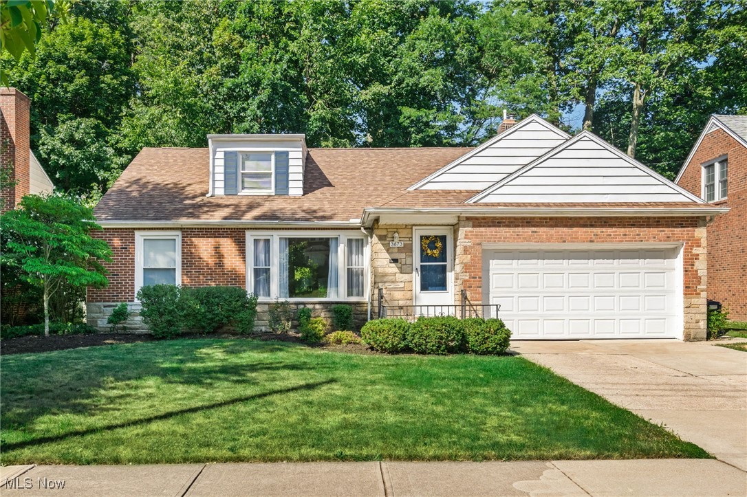 Welcome to this spacious and charming 4-bedroom, 2-bath home in the heart of Cleveland Heights! A rare find, this clean and well-maintained property features a flexible floor plan, generously sized rooms, and timeless architectural details throughout. Enjoy a bright living room with large windows and wood flooring, a formal dining room with built-ins, glass french doors, and a spacious eat-in kitchen featuring newer flooring, ample cabinetry, and included appliances. Two bedrooms and a full bath on the main level provide convenient living, while two additional bedrooms upstairs offer privacy and extra space. There is a bonus 5th room perfect for another bedroom or office space. Additional highlights include a first-floor laundry area, a newer hot water tank, and a freshly stained backyard deck. Outside, you’ll find a two-car attached garage, private yard, and mature landscaping—perfect for entertaining or relaxing. Ideally located near parks, schools, and University Circle, this home combines space, location, and character in one of Cleveland Heights' most desirable neighborhoods. Don’t miss this opportunity!
