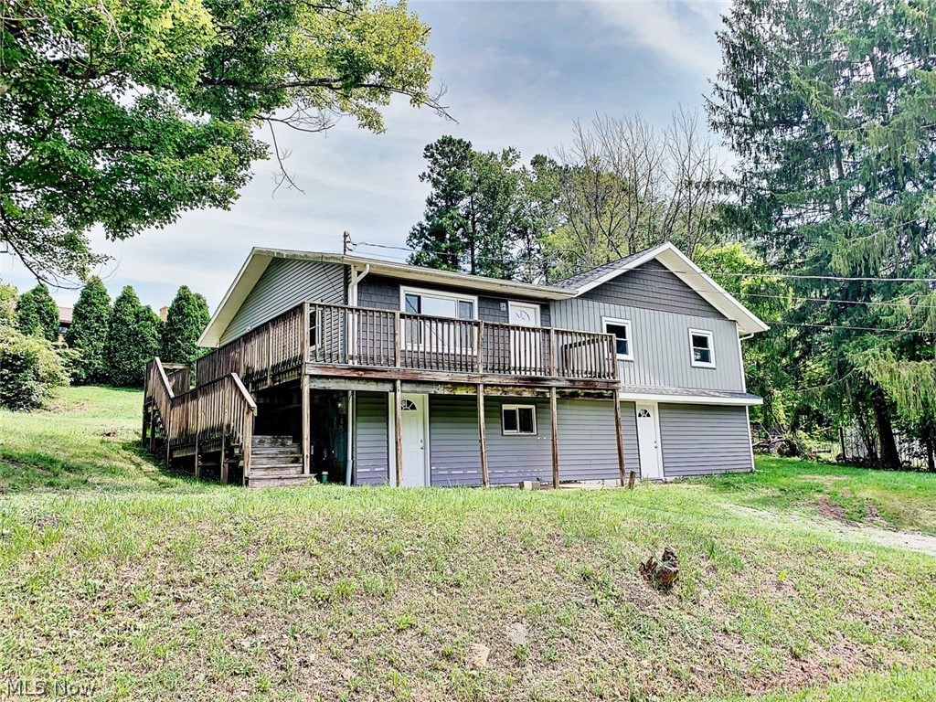 Nicely remodeled raised ranch right on the edge of town in a country-like location. This home has 3 bedrooms, 1 full bath and a first floor laundry room. It is situated on 4 lots that total .60 acres on a quiet dead-end street. There is a nice open floor plan with a large living room that has lots of natural light. The brand new kitchen is open to the dining area. There is a full walk out basement that could easily be finished for additional square feet if needed. Recent updates include a brand new roof, all new siding and insulation, a new electric hot water heater, all new laminate flooring, a new kitchen and a brand new bath. There is a storage shed. A new exterior drainage system has just been installed to prevent any water from coming into the basement. Immediate possession!