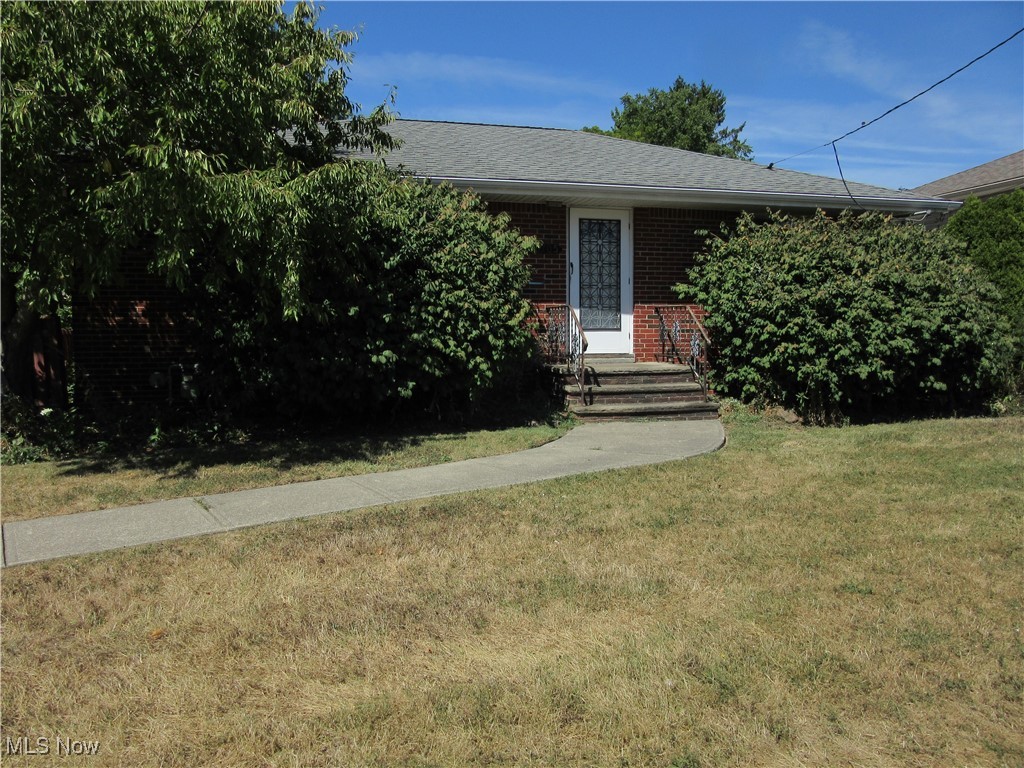 All Brick Ranch Available For Rehab! Full basement and detached two car garage. 3 bedrooms, 1 bath. Side entrance to the house is conveniently located near the driveway with two steps into the kitchen. The dining and living room combination is off the kitchen and leads to the bedrooms and bath. Front door access into the living room as well. Full basement with washer and dryer hookups. Corner lot with garage facing Harding and house facing Grant. A patio in between the back of the house and the garage is a fantastic use of space. Solid structure. Ideal fixer upper! Being sold as-is.