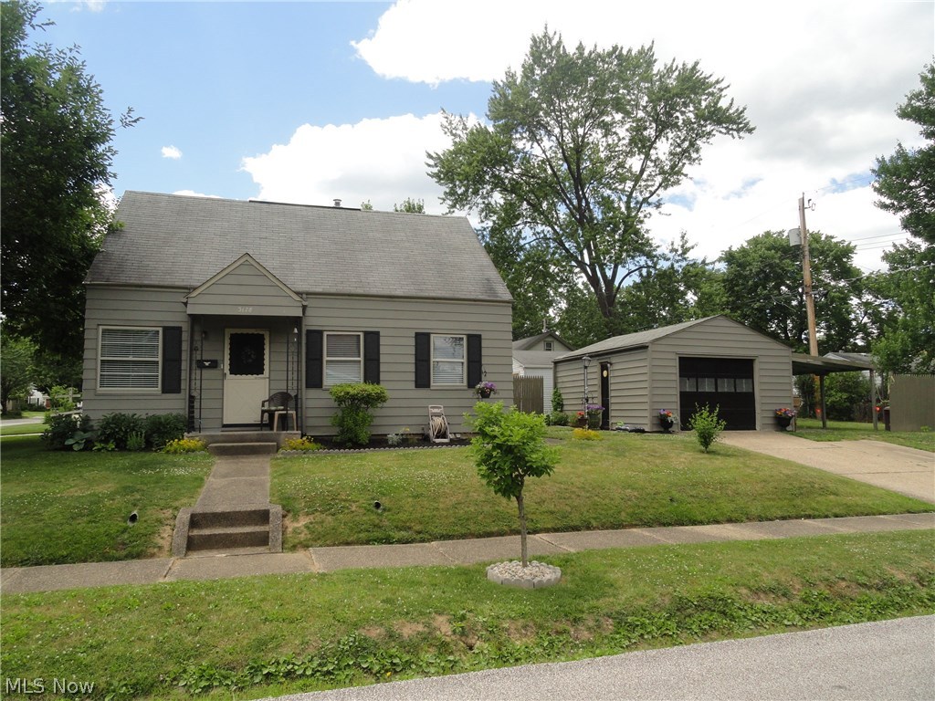 Beautiful corner lot cape cod in Cuyahoga Falls. Nicely landscaped with plenty of yard. Hardwood floors in the living room and in the two bedrooms on the first floor. Enjoy one of the bedrooms as a first floor master or use the larger 22 x 12 second level bedroom as the master. Second level has built in dresser, a long closet, and another large closet to be used as a walk-in or to provide extra storage. Clean kitchen with eat-in area. Whole first level nice, neutral paint in 2012. Upstairs and basement painted in 2016. Sparkling, updated bathroom. Enjoy the potential in the waterproofed basement. 1 car garage with additional carport. Offered with a Home Warranty.