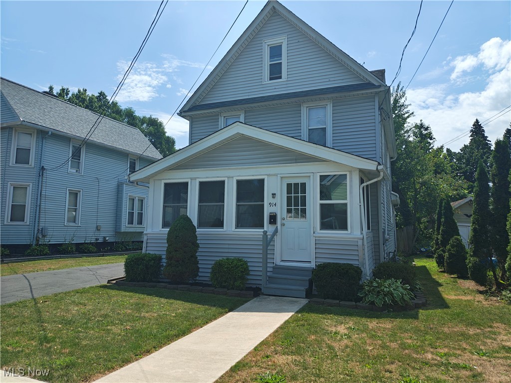 This refreshed 3-bedroom, 1-bath home blends original charm with smart updates. Step inside to find beautifully preserved original hardwood floors throughout the main living areas, complemented by new vinyl flooring in the kitchen. The cozy eat-in breakfast nook is perfect for casual meals, and the first-floor laundry adds everyday convenience.Enjoy the inviting covered front porch?ideal for morning coffee or relaxing evenings. A walk-up attic provides excellent additional storage or potential for creative use. The full, dry, unfinished basement offers even more space for hobbies or future finishing.Outside, the property features a partially fenced yard, perfect for pets or gardening, and a spacious 2-car garage for parking and storage.Move-in ready and full of potential?don?t miss the opportunity to make this charming home your own! Schedule your showing today!