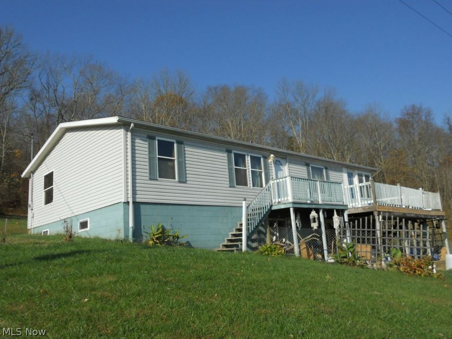 Spacious 5 +bedroom home with full additional every qualities in basement. The main level has 4 spacious bedrooms and two full baths. Large great room is open to the kitchen and dining area. In the kitchen you will find loads of cabinet space and countertop space. Range and refrigerator are optional. Large laundry area on main floor. The lower level contains a large family room, 2 additional rooms that could be used for bedrooms, home office or a craft room, as well as a full kitchen and full bath. Home sits on 5.01 acres.