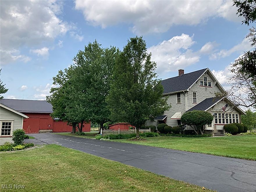 “Lucky Bell Farm” 51.5-Acre Farm, Hartford Twp., Trumbull Co., Badger Local Schools, Quality Home, Barn, Arena, Timber, Etc., Offered in Parcels & As Unit, Multi Par. Online Bidding Available on Real Estate. ABSOLUTE AUCTION, all sells to the highest bidder on location. ONLINE AND LIVE ON-SITE BIDDING WILL BEGIN THURSDAY, AUGUST 22, 2024, 3:00 PM, REAL ESTATE SELLS AT 5:00 PM.
Blacktop drive. Park-like setting. 51.5 acres total, half open farmland, balance wooded in rear. Offered in 3 parcels and as a unit. Quality two-story, three-bedroom home with 2 full baths. Enclosed finished front porch, rear deck, side studio addition with cathedral ceilings and shower bath, beautiful custom oak kitchen with island, dining area, living room with stone fireplace, original woodwork throughout, rear deck, brick patio and Koi Pond, three bedrooms and full bath up. Good dry waterproof basement, new gas 3 zone boiler heat plus central air on main level. New Generac whole-house backup generator, new shingle roof, detached garage, antique Amish-built post and beam picnic pavilion with slate roof, and barn with 10 horse stalls, hay loft, tack room, wash rack, and attached 60 X 104 indoor riding arena with metal roof open shed, small garden shed, chicken house. Barn and arena newly rewired. Mature apple orchard. Approx. 1 acre fenced paddock with loafing shed. Nice hay meadows, woods in rear. Divided as follow: Parcel #1: 15.9 acres with home and all outbuildings mentioned above. Parcel #2: 10.5 acres, all open farmland, lays nice. Parcel #3: 25.1 acres, 1/3 open farmland, woods in rear, some timber, great hunting. Mineral rights transfer. Note: Shown by appointment. Walk the land at your leisure. Maps at site or visit us on the web. Questions on financing or how to buy, call the auctioneer.