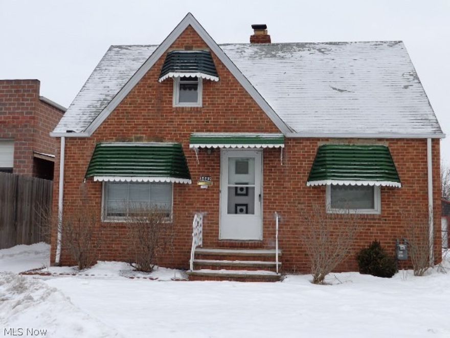 Solid Brick Bungalow in need of some work!!Close to bus,schools!!Bank owned!!