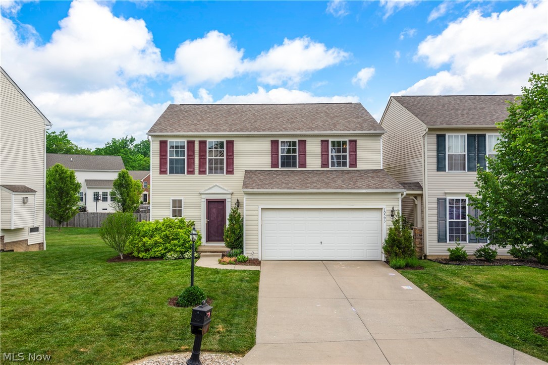 This beautiful colonial in Reminderville has everything that you need. A large great room that boast tons of natural light and a gas fireplace leads into the eat-in kitchen. The kitchen features an island, desk and large walk-in pantry. Upstairs, you'll find the owner's suite with an over-sized walk-in closet and private bath. Down the hall, you'll find two additional spacious bedrooms and a second full bathroom. The laundry room is conveniently located on 2nd floor as well. The large partially finished basement is great for an additional space to entertain and storage. Enjoy evenings on your deck overlooking your backyard and garden.
