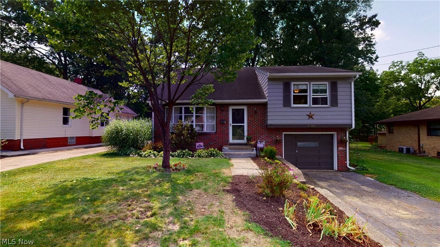 Unique 3-level split level with 1st & 2nd levels open to each other - including a "loft" (no wall) dining room overlooking living room, plus open kitchen with breakfast bar and eating area, all on 2nd floor.  First floor is the living room with cathedral ceiling and large, front window letting in lots of natural light.  Must see to believe!!  Definitely not a cookie cutter home!!  Completing the 2nd level are three bedrooms and full bathroom.  Lower level has huge family room, and big combination full bath/laundry/boiler/storage room, along with walk-out to .4 acre backyard. There's a second walk-out to attached, heated garage that has a bump-out workshop area and crawl space storage area. Shed in backyard.  Hardwood floors throughout most of 1st & 2nd floors, except kitchen.  Newer carpet in family room.  Home Warranty included.  Great home in great neighborhood waiting for you to move in!  Make your showing appointment now!