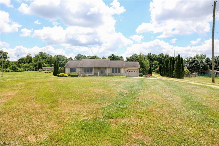 Discover this inviting ranch-style home nestled on a spacious 1.56-acre lot conveniently located on Route 3. Built in 2003, this 1,860 square foot residence boasts an open floor plan, ideal for modern living. The home features a generously sized living room that flows seamlessly into a dining area and a spacious kitchen. The kitchen is highlighted by a large L-shaped island and modern appliances, perfect for entertaining guests. Step into the large master bedroom that allows for an abundance of natural light through two large picture windows, complemented by an adjoining full bathroom with a relaxing jacuzzi tub. The second bedroom is sizeable and offers comfortable living space. The expansive basement provides excellent storage and houses all utilities, with the potential for further customization. Additional amenities include first-floor laundry and a convenient one-car garage.
Outside, the well-maintained backyard features two small porches and a storage barn, creating a tranquil outdoor retreat. The rest of the acreage is a flat field bordered by trees. Perfect for a garden or expansion projects. Don't miss the opportunity to own this inviting home in a desirable location. Schedule your showing today!
Utilities: full house heat and AC.