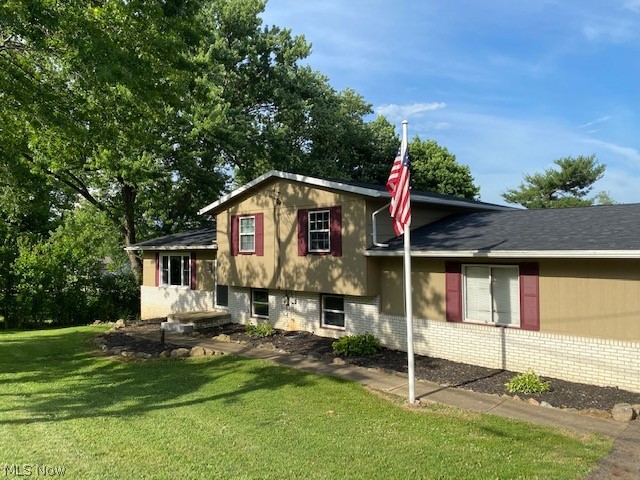 Very well maintained home in Perry Township. This 3 bed/2 bath split level sits on over an acre with fenced in backyard and a 2 car attached garage. Brand new roof installed May 2020. All walls and ceilings have a fresh coat of paint. Remodeled kitchen, bar and bathroom. New floors in kitchen and dining room as well as bathroom.