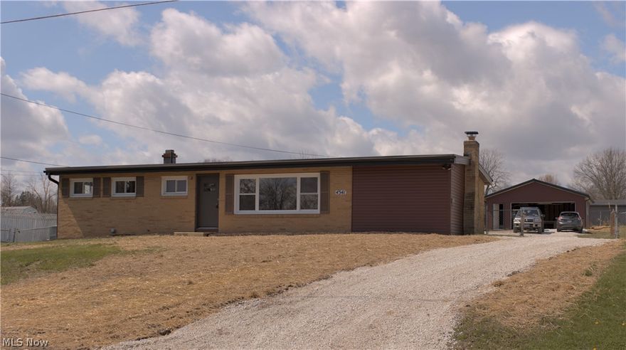 Wow! This 3 bedroom ranch features over 1700 square feet of living space resting on nearly half acre lot! The list of quality upgrades and improvements is extensive! A brand new kitchen comes with new cabinetry with soft close drawers, corian countertops, porcelain tile backsplash and new flooring. This home is much larger than it appears. 3 living areas include a living room with hardwood flooring, fabulous family room with stone fireplace and wood burning insert, cathedral ceiling, and new carpet, and a lower level rec room with industrial ceiling and new carpet. The oversized 2 car garage has new roof, siding, windows and door. Other updates include roof, central air, plumbing and drains, interior paint and much more! Fantastic location to shopping, highway etc. and walk to school! Take a look!